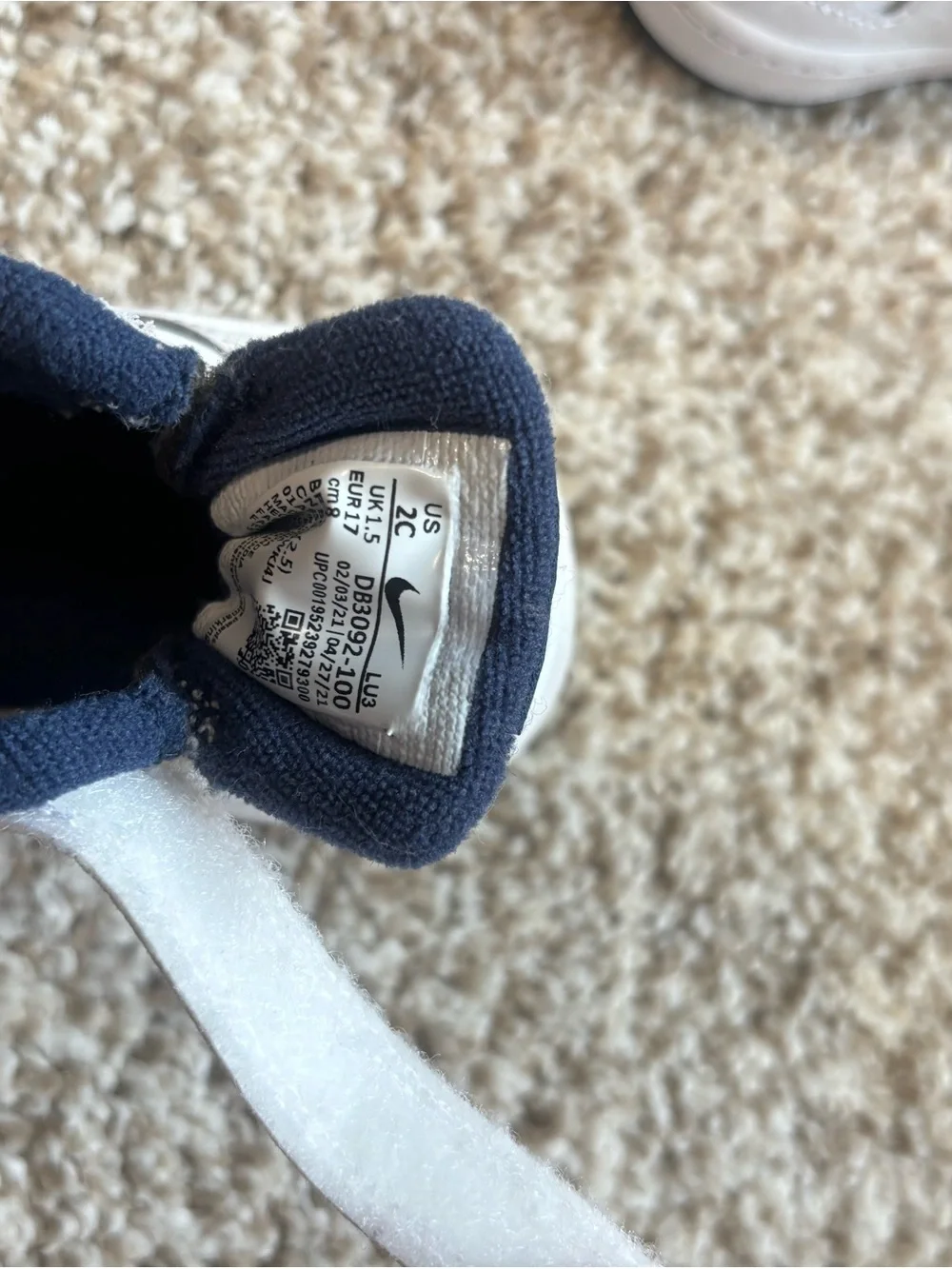 Nike Kids White Sneakers with Navy Lining and Pink Swoosh